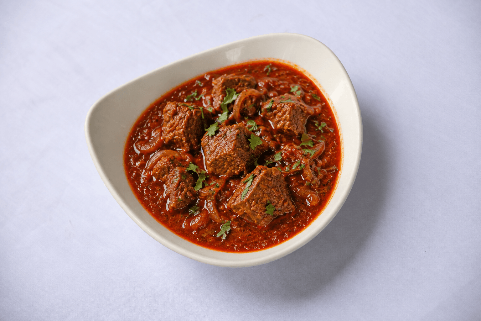 Lamb Rogan Josh, served at India Oven Sacramento