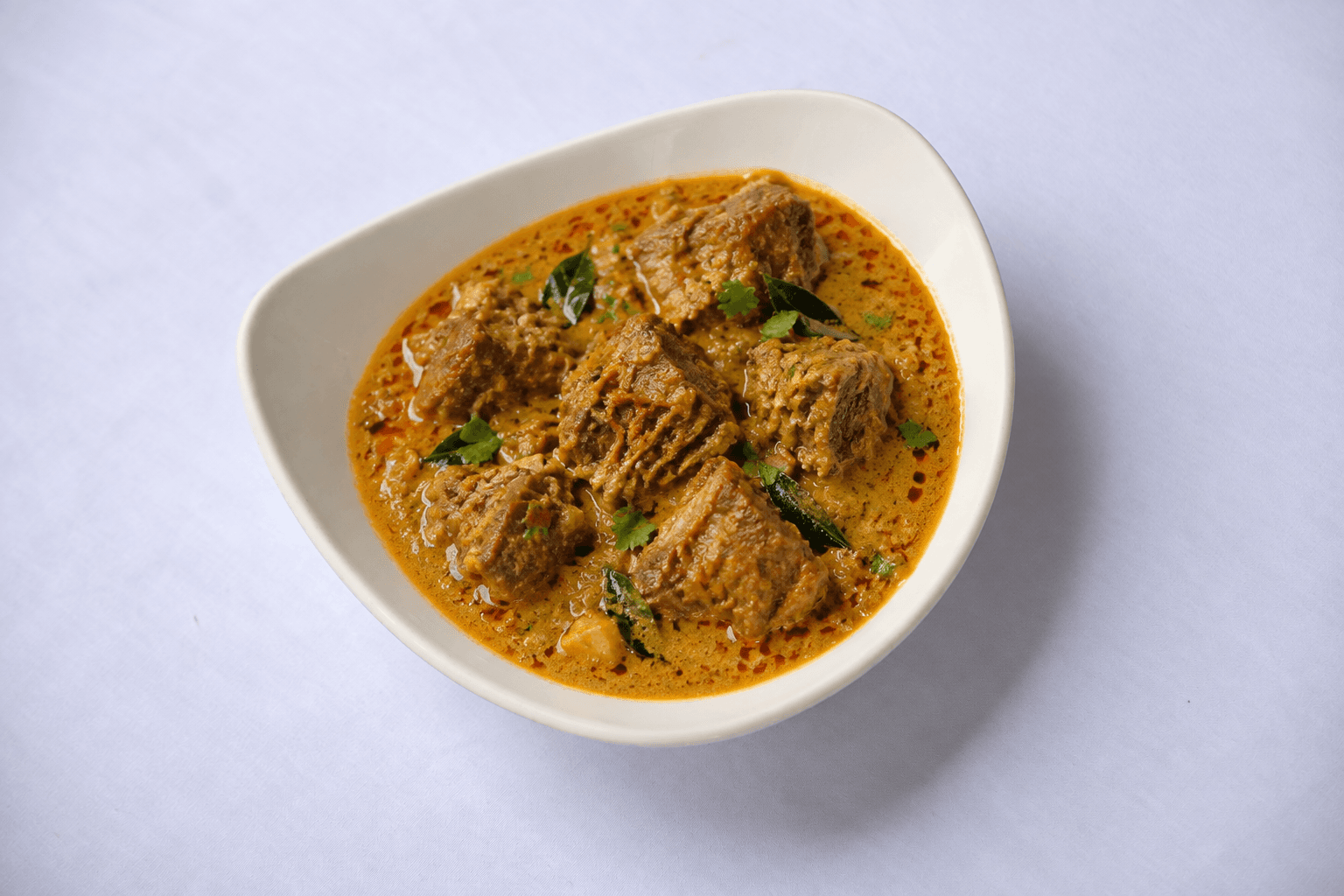 Coconut Lamb Curry, served at India Oven Sacramento